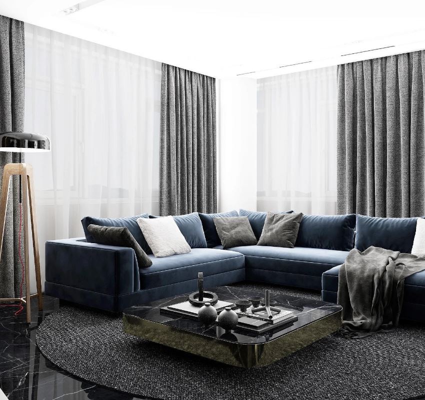Синий диван в серо-черном интерьере