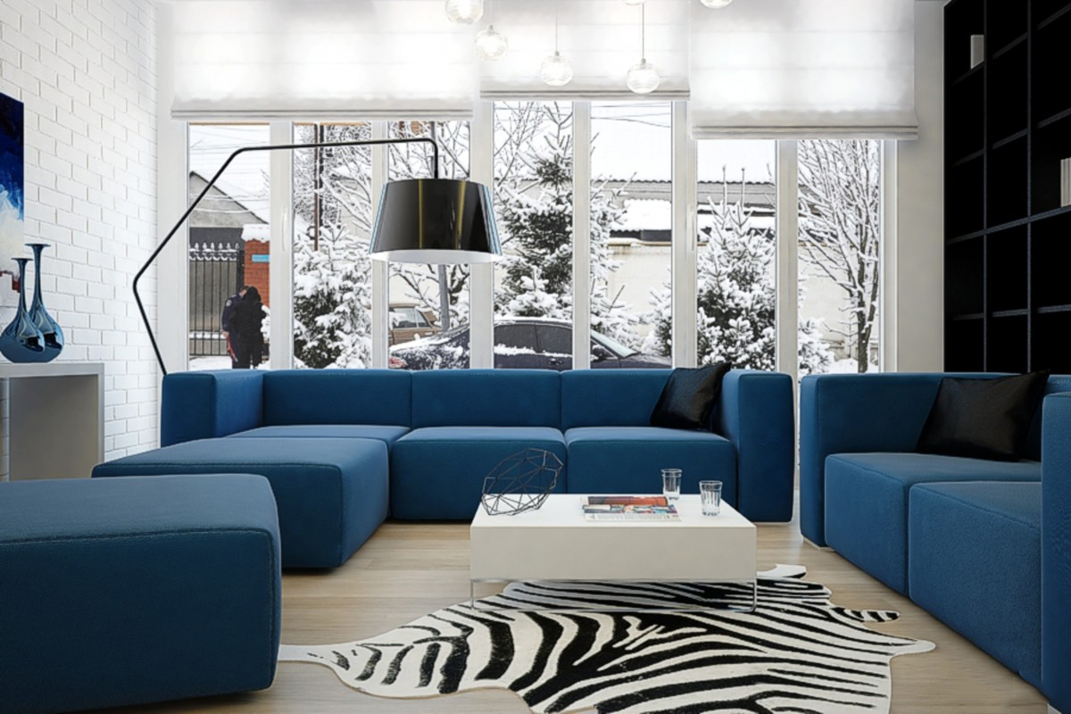 Модульный диван голубого цвета в гостиной.