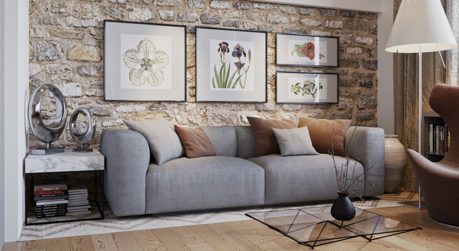 Серый диван можно дополнить коричневыми подушками, которые перекликаются с другими интерьерными элементами