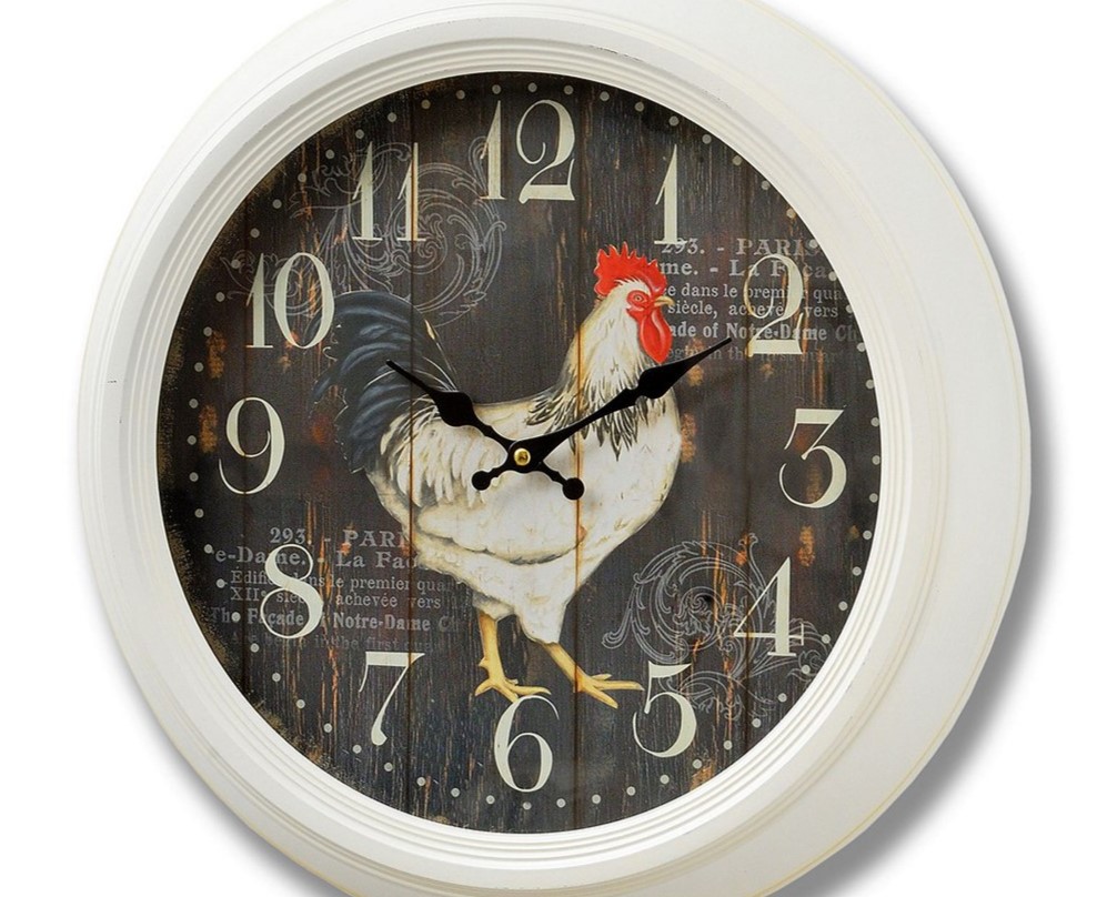 Часы и изображением животных можно использовать в интерьере кухни