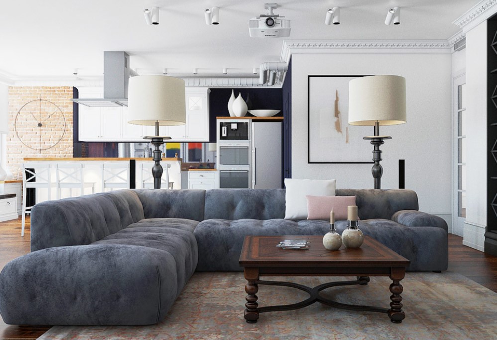 Угловой диван можно использовать для разделения комнаты на гостиную и кухню