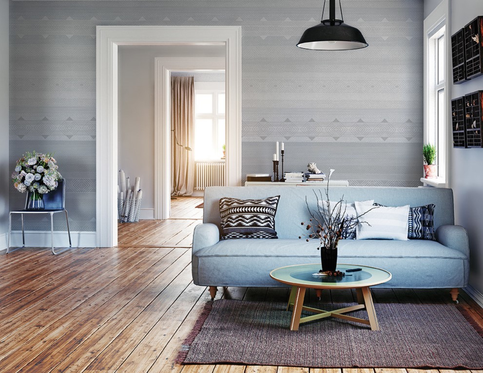 В качестве декора в скандинавской гостиной можно использовать подушки с геометрическими узорами