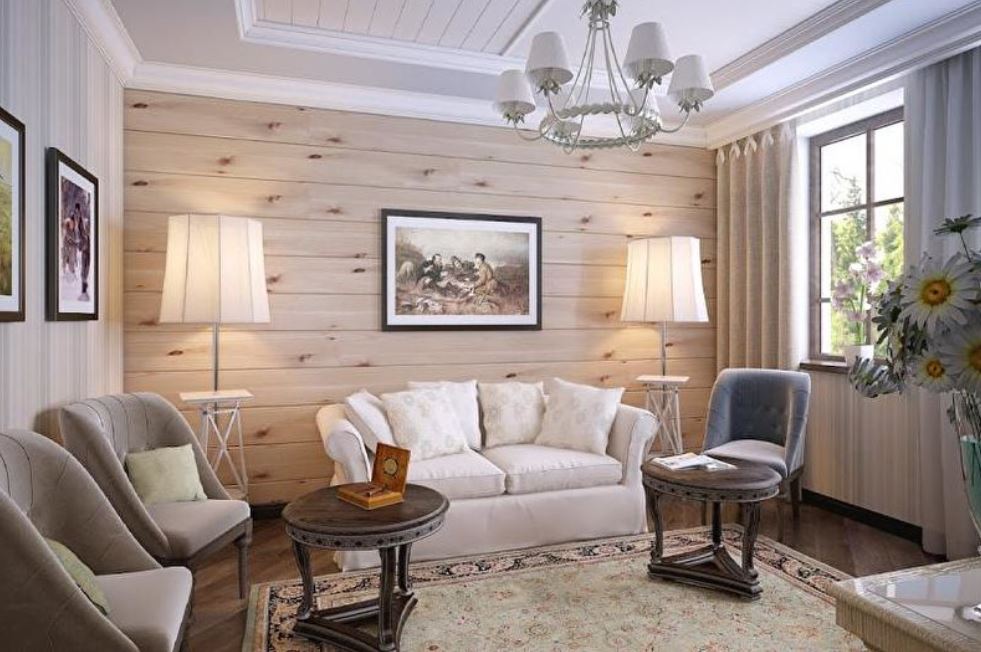 Теплые оттенки и акцентная деревянная стена создают милую домашнюю атмосферу в гостиной