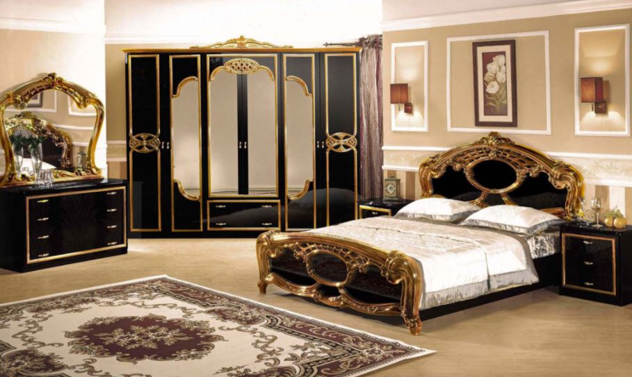 Роскошная темная мебель с золотым декором для спальни