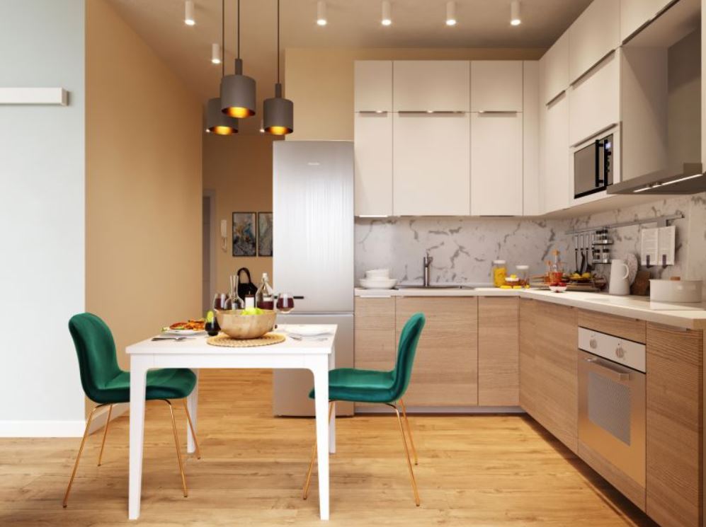 Зеленые стулья в кухне освежают обстановку и создают необходимый цветовой акцент