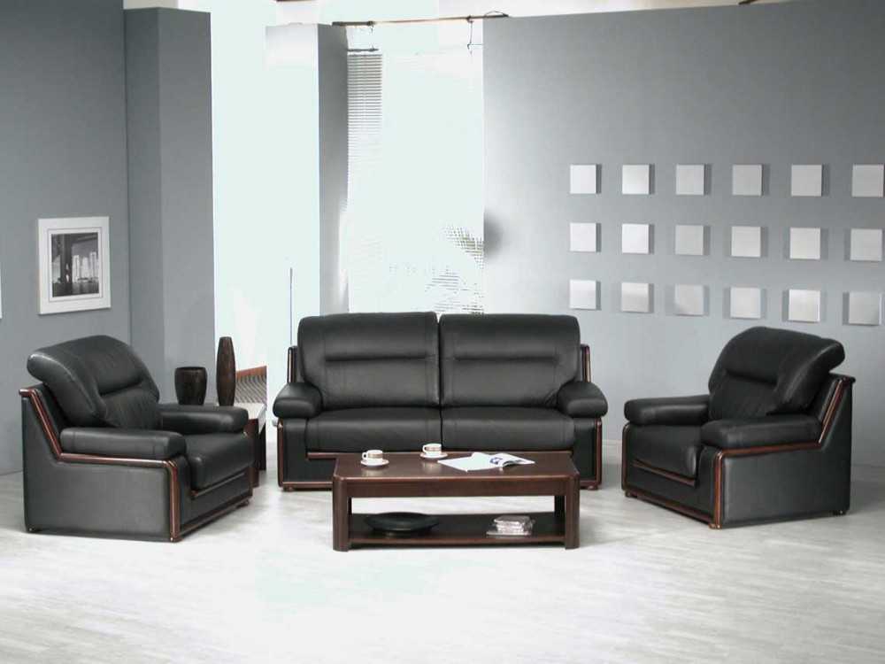 Кожаный черный диван в рабочем кабинете подчеркнет статус хозяина